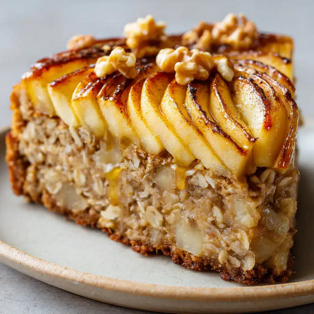 Healthy Oatmeal Apple Cake: A Wholesome Slice of Heaven 2 A handheld close-up of a single slice of baked oatmeal apple cake on a ceramic plate. The dense oat base, caramelized apple topping, and maple syrup drizzle are clearly visible. (Healthy Oatmeal Apple Cake)