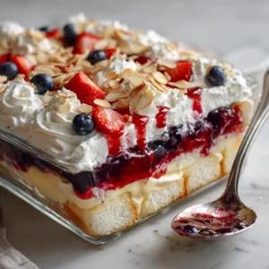 Close-up of Heaven on Earth Cake layers featuring fluffy angel food cake cubes and thick vanilla pudding.
