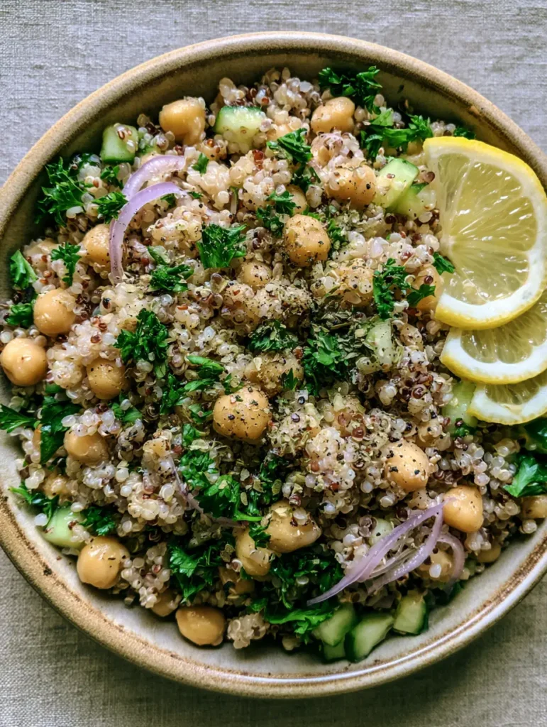 Close-up of the glistening lemon oil dressing on the Lemon Herb Quinoa with Chickpeas.